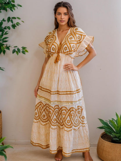 Vestido longo bordado caramelo