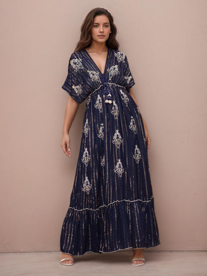 Vestido longo bordado manga morcego